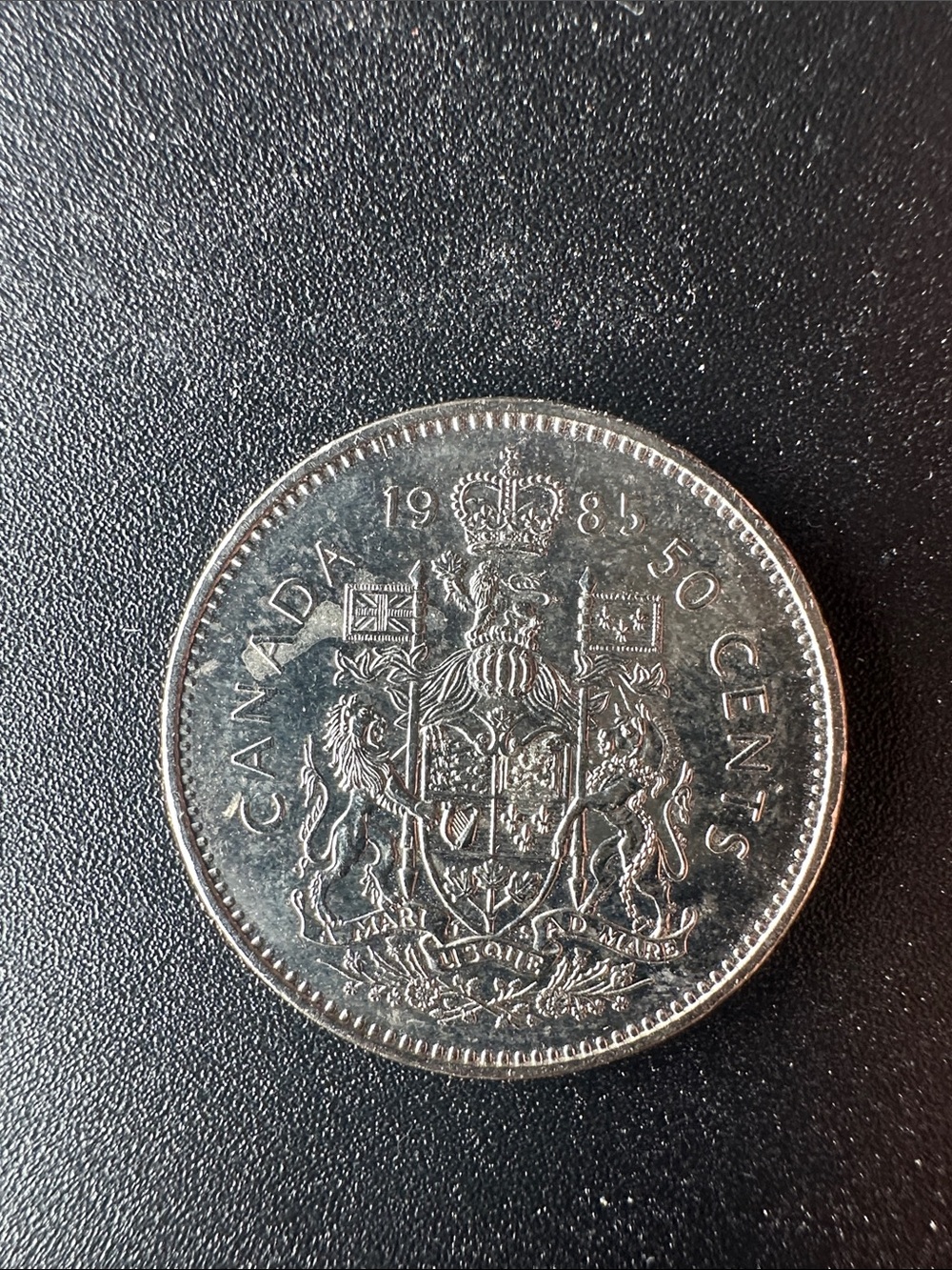 1985 Canadian 50 Cent Coin - Silver Tone - Amazing Condition